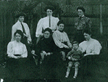 The daughters of John Jeffries Davis, together with Tommy Watkins Baker, son of Mary. Tommy was born 1905. This photograph was supplied by Bruce Coates on 6th July 2005, from his grandmother's album: the caption says it was taken in Croydon in 1906 or 1907.